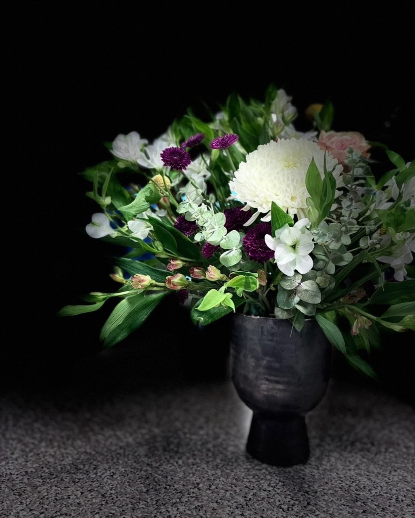 White disbud mum with alstroemeria in a pewter pedestal vase