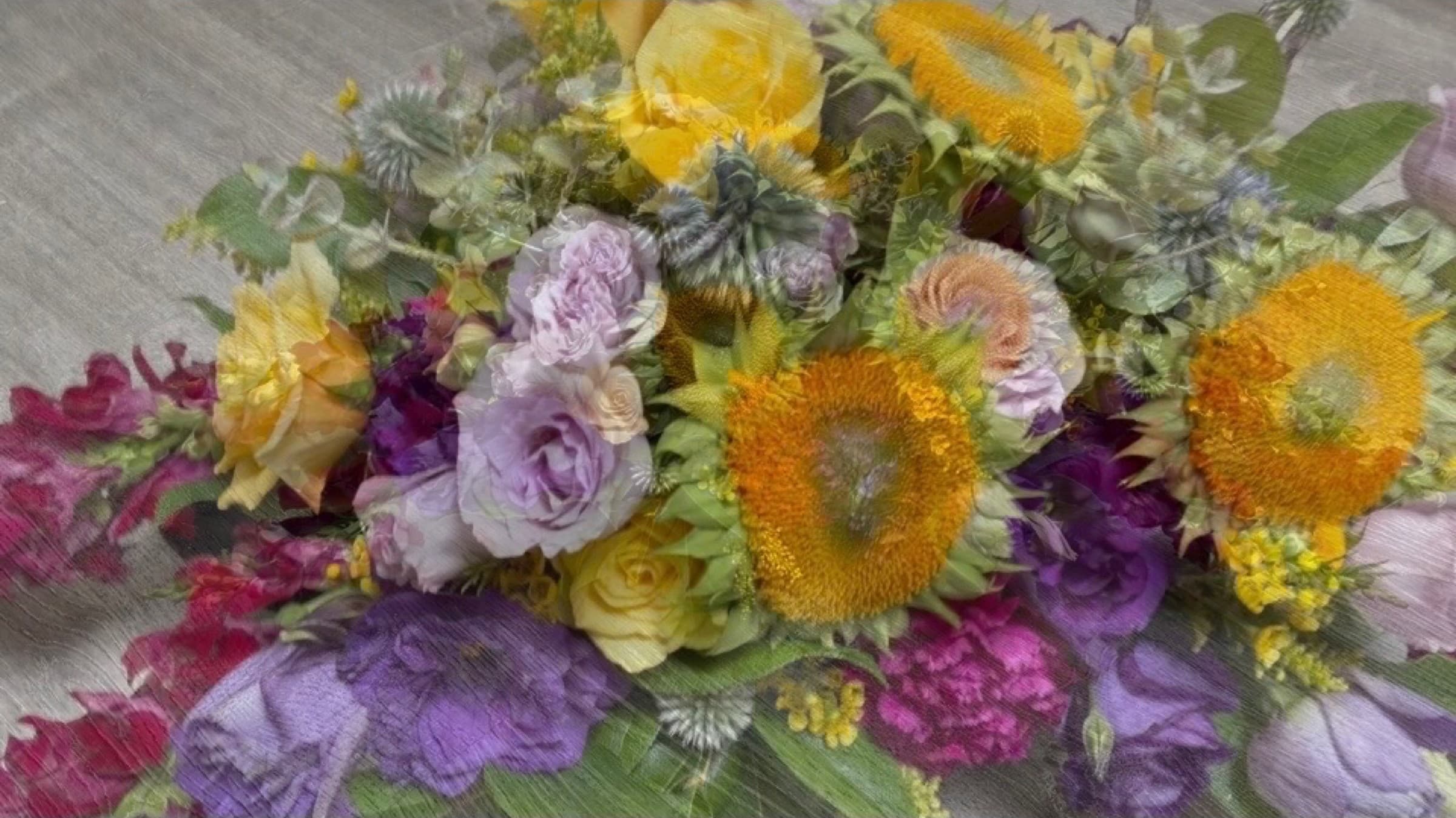 Sunflowers, lisianthus and yellow roses