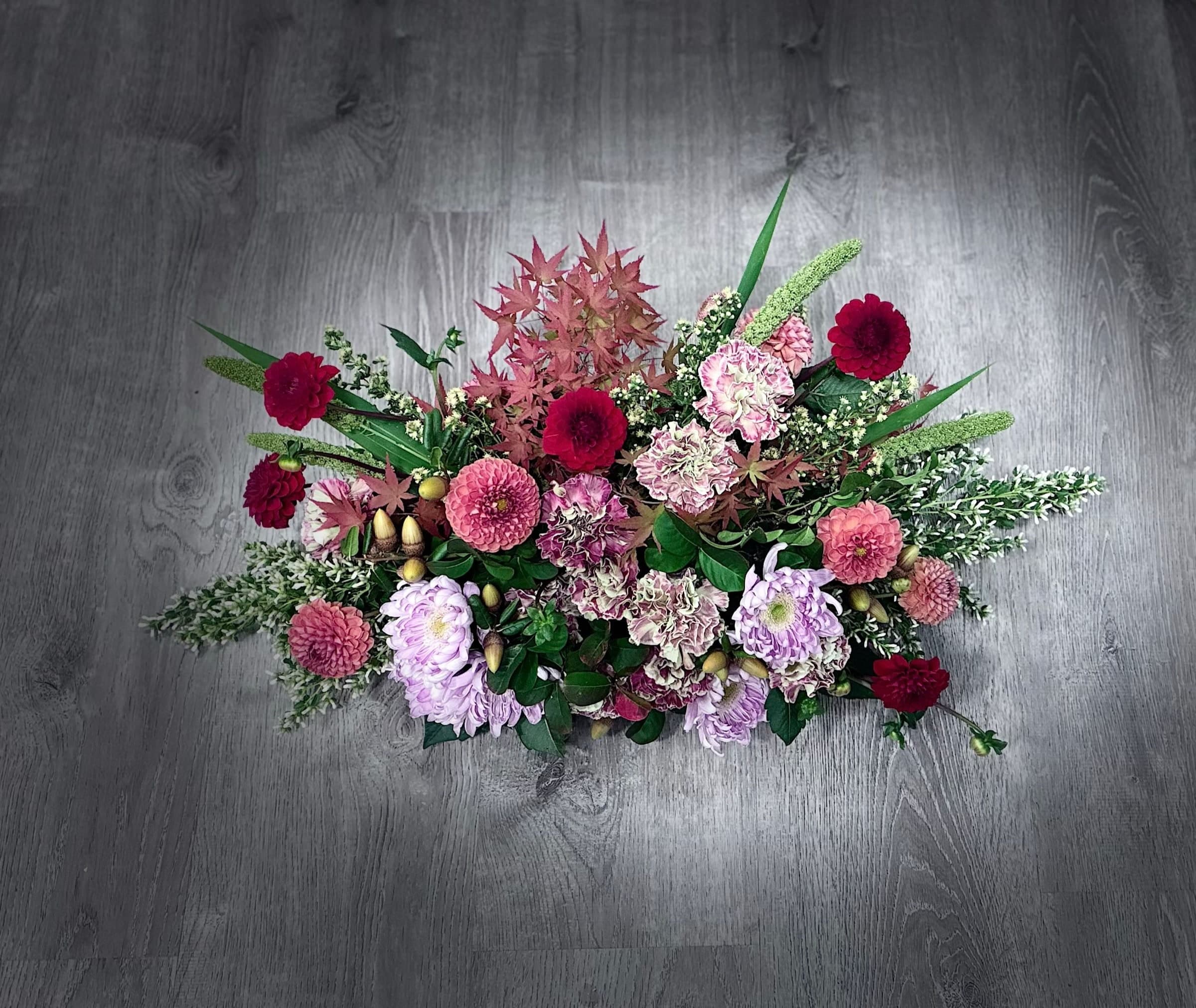 Flat lay of dahlias, carnations and astilbe
